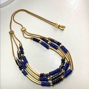 Antiqued gold and blue necklace